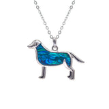 Natural Paua Shell Cute Waggy Tail Dog Necklace, by Byzantium. Rhodium Plated and 35mm in size