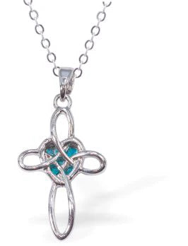 Paua Shell Cross with Heart Necklace  Hypoallergenic: Rhodium Plated, Nickel, Lead and Cadmium Free Greeny Blue in colour, Crystal encrusted. 24mm in size See matching earrings P487 Delivered in a soft, black, velveteen pouch